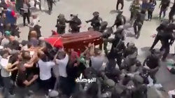 [WIDEO] Niezwykle brutalne zachowanie izraelskiej policji podczas pogrzebu zabitej dziennikarki - miniaturka